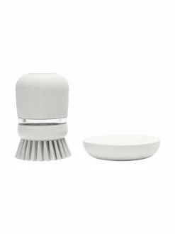 Saippuaa annosteleva tiskiharja