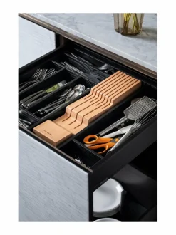 Veitsien säilytyspalkki